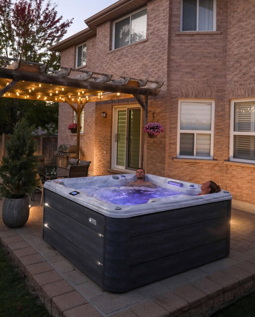Couple relaxing in a Sundance Spas 780 Series hot tub 4